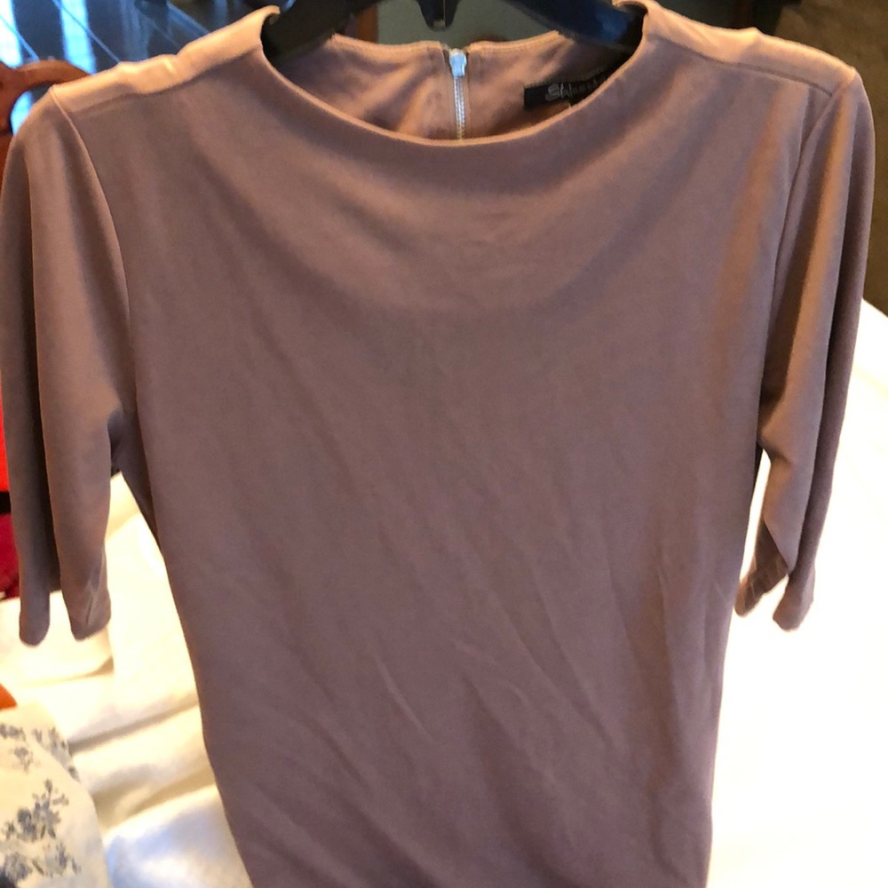This shinestar dress is lined only in the front.